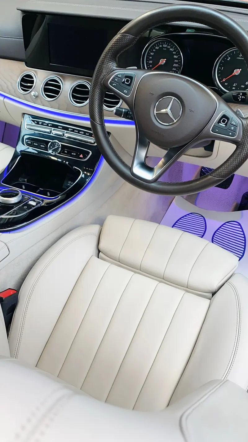 Cream leather seats in a Mercedes-Benz after leather cleaning and conditioning